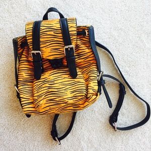 Furry tiger mini backpack from Dolls Kill